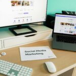 Stylish workspace with laptop and monitor for social media marketing.